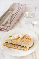 sandwich with ham and lettuce on the plate