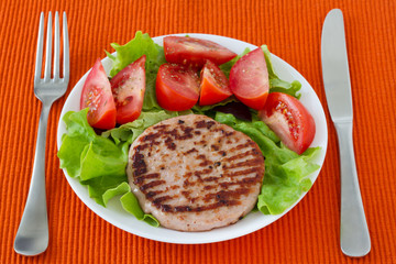 fried turkey hamburger with salad