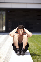 Athlete man making abdominals