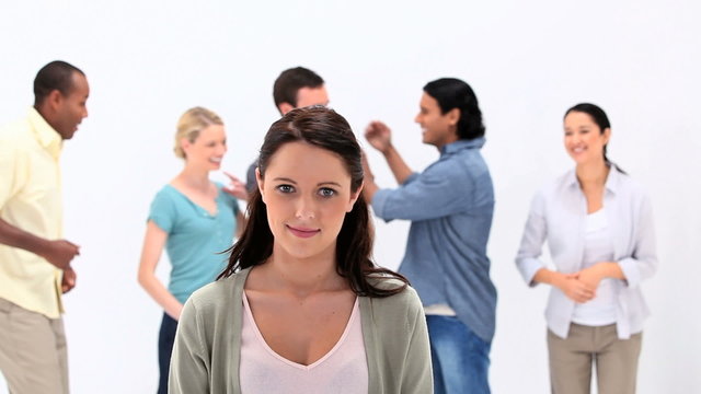 Smiling woman with embarrassing friends