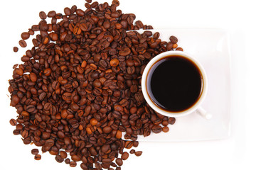 Cup with coffee. costing on coffee grain