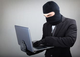 Computer Hacker in suit and tie