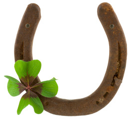 symboles de chance : fer à cheval, trèfle 4 feuilles