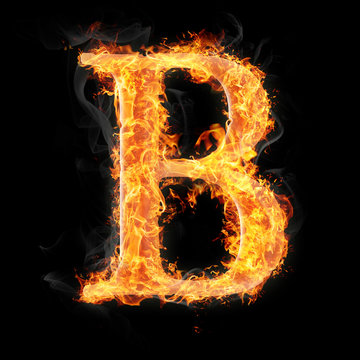 Fonts and symbols in fire on black background - B