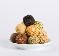 Different kinds of truffles on a plate