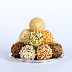 Different kinds of truffles on a silver plate