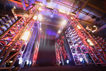 Illuminated way to boxing ring inside fight club