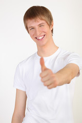 portrait of happy young blond man wearing white T-shirt on white