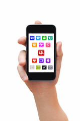Hand holding smartphone with applications icons