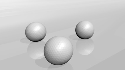 3 white golf balls