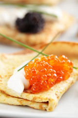 Crepes with caviar