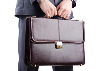 Businessman with briefcase on white