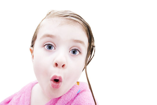 A surprised baby on white background