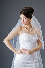 Bride in wedding dress in studio shooting