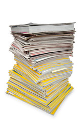 Books in high stack isolated on white