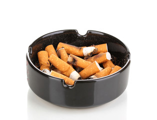 Cigarette butts in ashtray isolateed on white