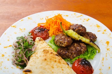 Meat cuisine - kebab served in plate