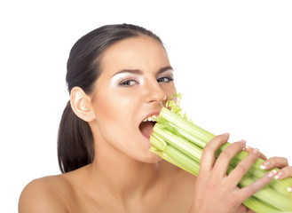 oung woman with vegetables and measuring tape