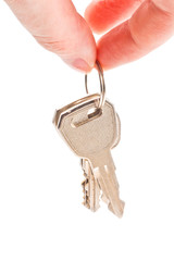 human hand with keys on white