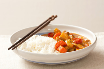 Delicious pork curry served with hot Thai jasmine rice