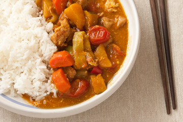 Delicious pork curry served with hot Thai jasmine rice