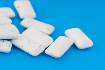 Chewing gums on blue