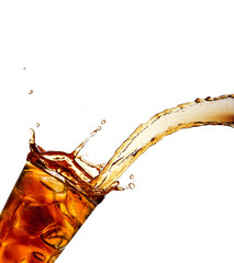 Pouring cola into glass, isolated on white background