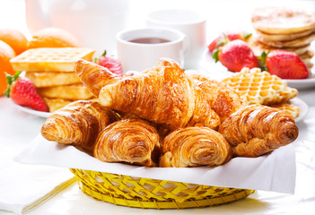 breakfast with fresh croissants