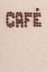 The word cafe written with coffee beans