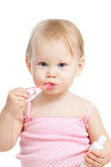 baby cleaning teeth and smiling, isolated on white background