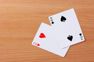 Two cards on wooden background