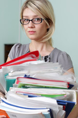 There is a lot of paper work in the office.