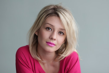 Fototapeta premium Portrait of young beautiful blond girl