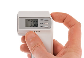 Modern infra-red digital thermometer with hand isolated on white