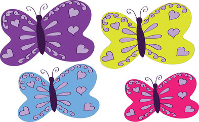 Quatre papillons multicolores