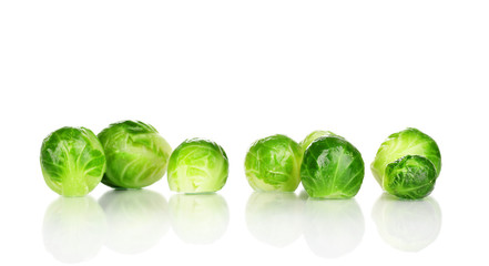 Fresh brussels sprouts isolated on white