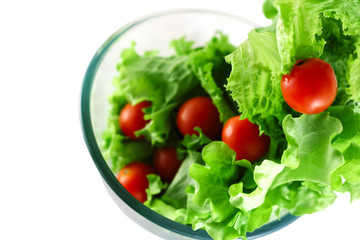 Light lettuce and tomatoes flying salad concept