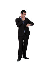 businessman consulting his watch