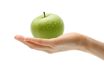 Female hand with an apple