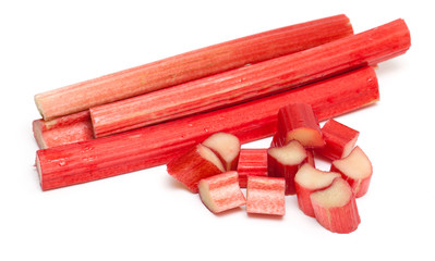 freshly cut stems of rhubarb on a white background