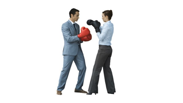 Coworkers in slow motion boxing together