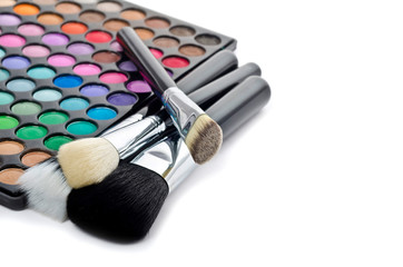 Multi colored make-up and brushes