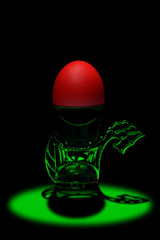 Red Easter egg on metal support