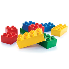 Various scattered toy building bricks