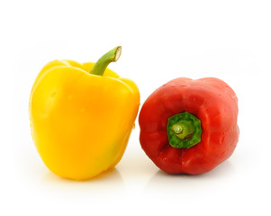 Red and yellow sweet pepper isolated on white background