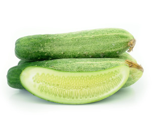 Cucumber and slices isolated over white background.
