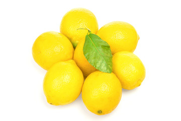 lemons with green leaf