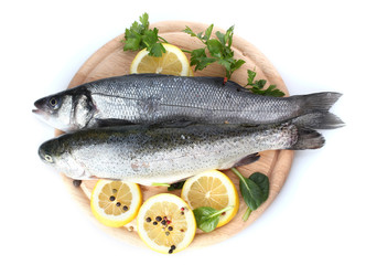 Fresh fishes with lemon, parsley and spice