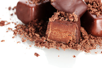 Сhocolate candy covered with chocolate shavings isolated