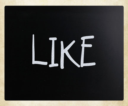 "Like" handwritten with white chalk on a blackboard